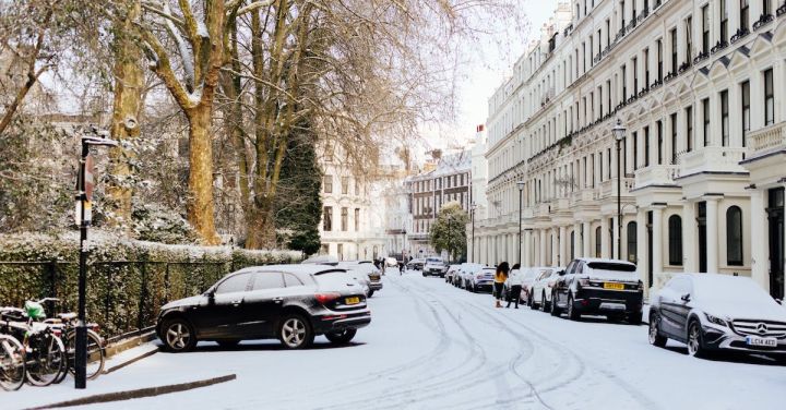 London Winter Festivity - London streets covered with snow on sunny day