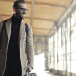 Business Trip - Man in Brown Robe Carrying Bag Smiling